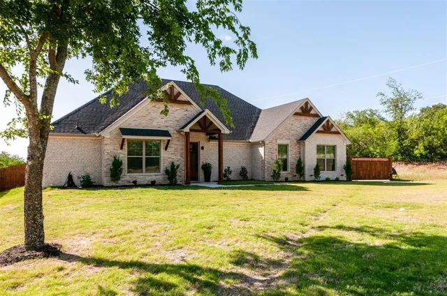 a view of a house with a swimming pool