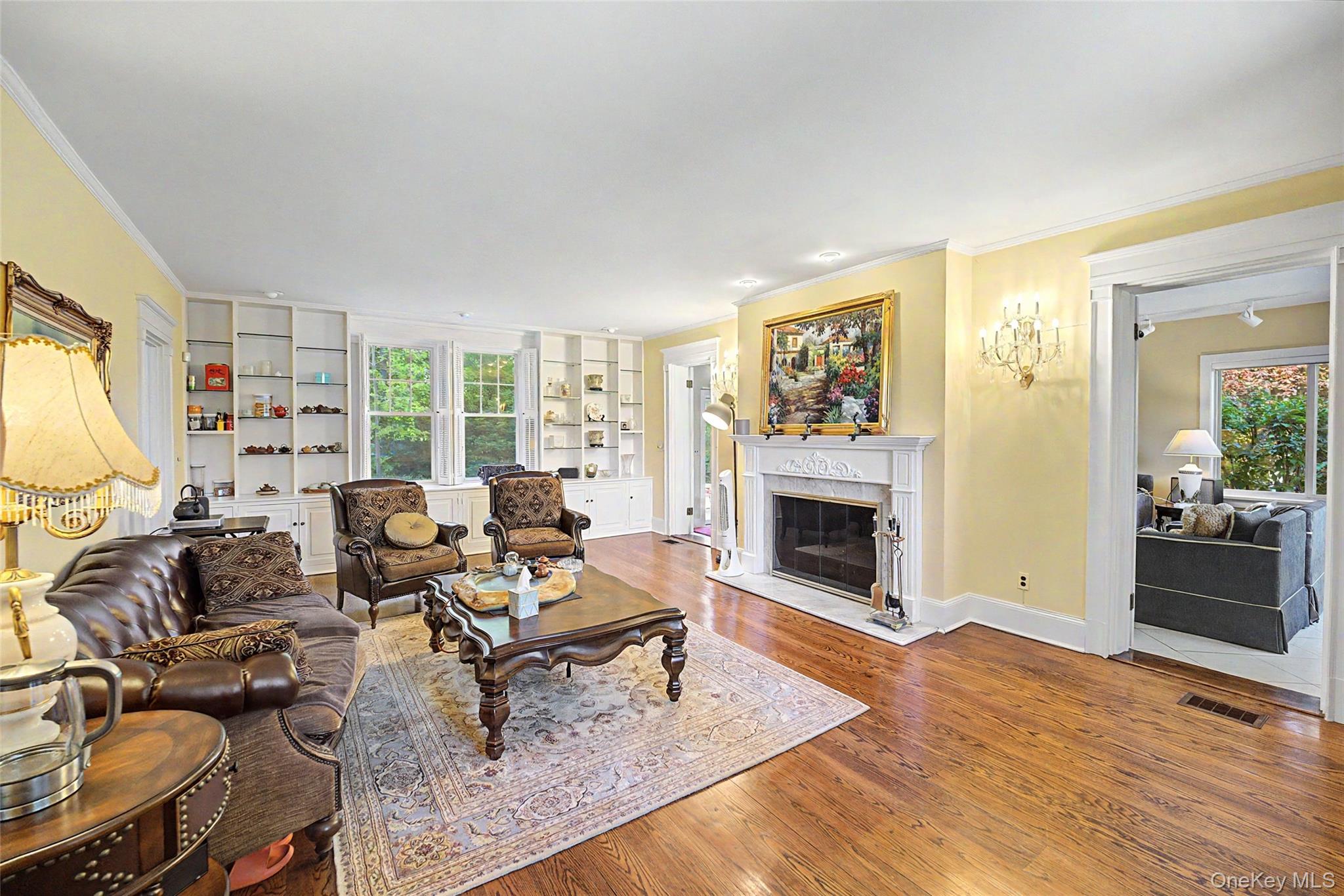 23 Townsend Road Glen Cove, NY 11542 - Photo 9 of 23 a living room with furniture fireplace and window