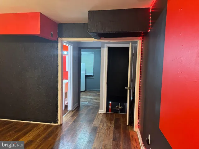 a view of a livingroom with wooden floor