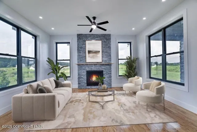 a living room with furniture and a fireplace