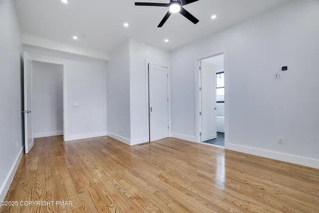 a bathroom with a sink toilet and mirror