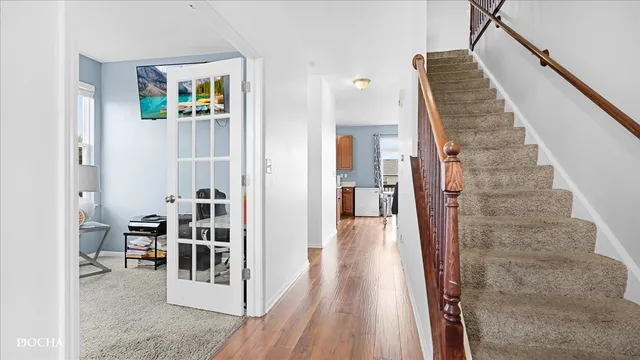 a view of a bedroom from a hallway