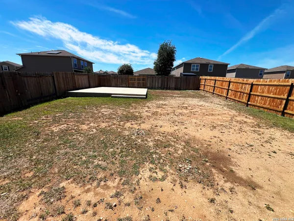 a view of a backyard with a garden