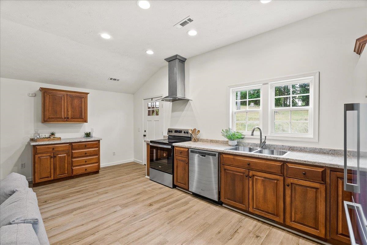 765 Union Church Road Churchville, VA 24421 - Photo 15 of 35 a large kitchen with stainless steel appliances granite countertop a sink dishwasher stove and oven with wooden floor