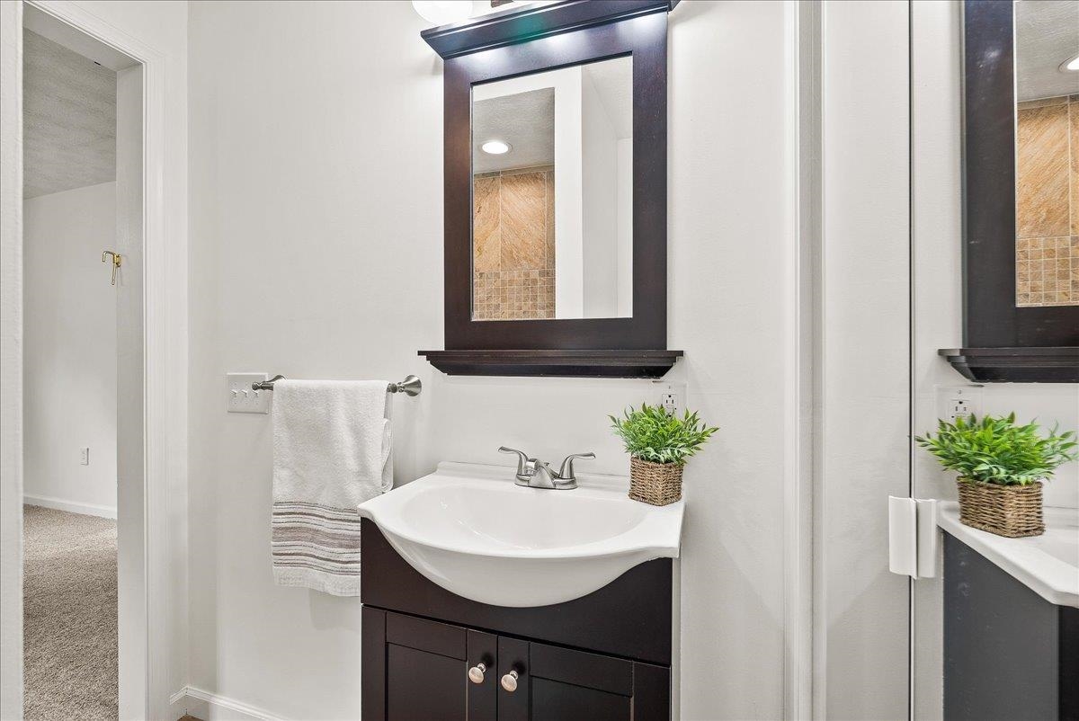 765 Union Church Road Churchville, VA 24421 - Photo 22 of 35 a bathroom with a sink and a mirror