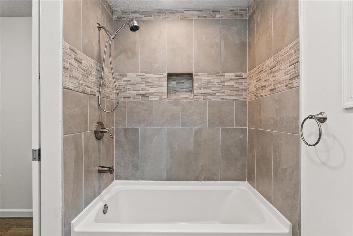 765 Union Church Road Churchville, VA 24421 - Photo 26 of 35 a bathroom with a bath tub and shower