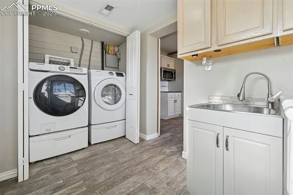 a utility room with dryer and washer