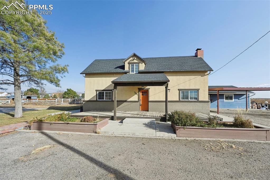 7865 Wilson Road Fountain, CO 80817 - Photo 2 of 46 a view of a house with outdoor space and sitting area
