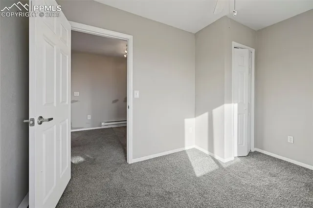 an empty room with a bathroom