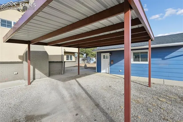 a view of house with wooden floor and roof