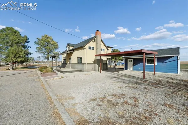 a view of a house with a patio
