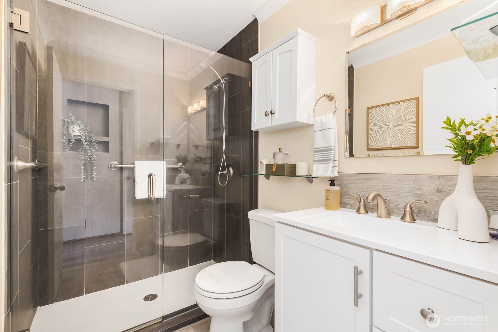 13279 15th Avenue Northeast, Unit B20 Seattle, WA 98125 - Photo 18 of 32 a bathroom with a sink toilet and shower