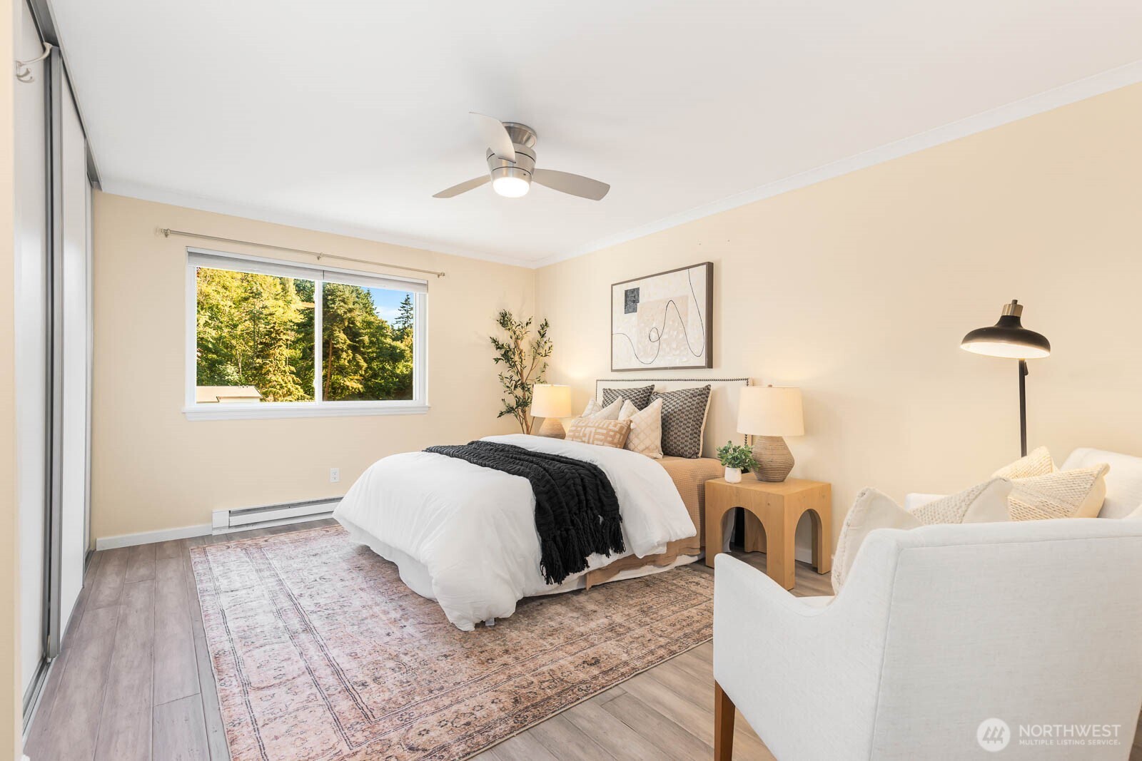 13279 15th Avenue Northeast, Unit B20 Seattle, WA 98125 - Photo 19 of 32 a bedroom with a large bed and a window