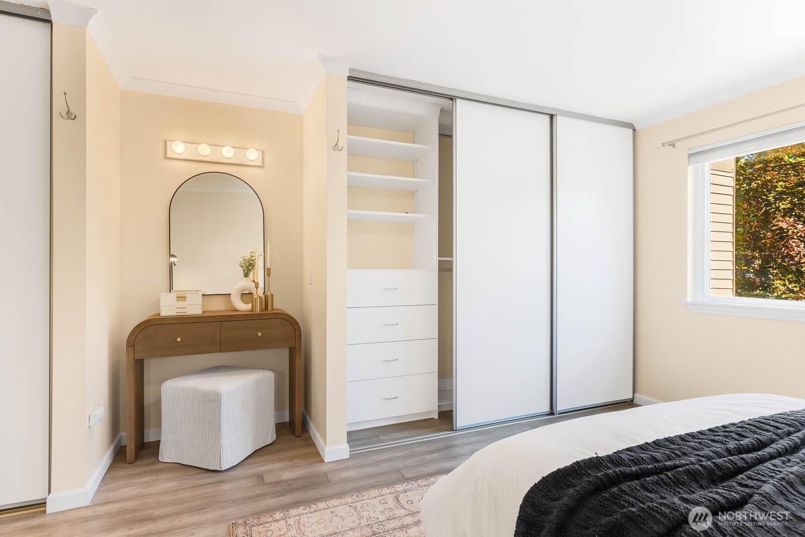 13279 15th Avenue Northeast, Unit B20 Seattle, WA 98125 - Photo 22 of 32 a bedroom with a bed and a mirror