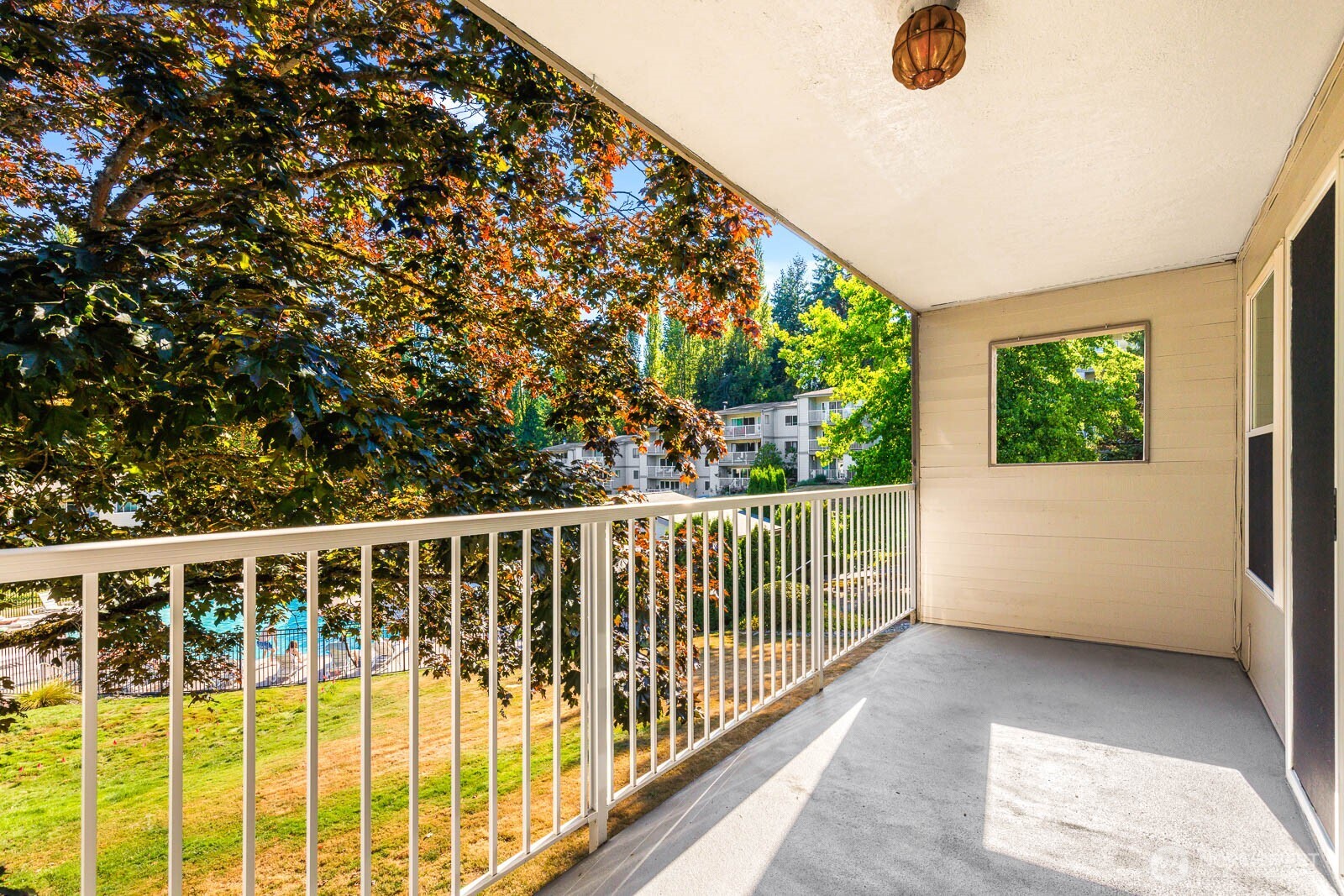 13279 15th Avenue Northeast, Unit B20 Seattle, WA 98125 - Photo 23 of 32 a view of balcony with yard