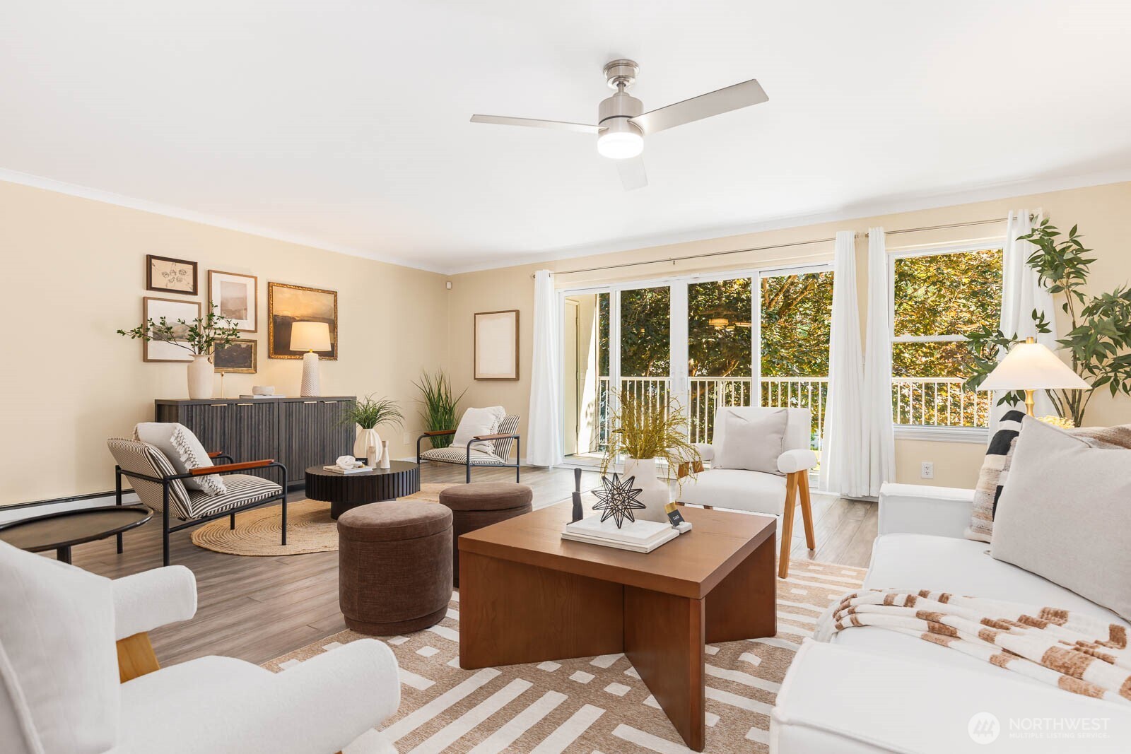 13279 15th Avenue Northeast, Unit B20 Seattle, WA 98125 - Photo 5 of 32 a living room with furniture and large windows