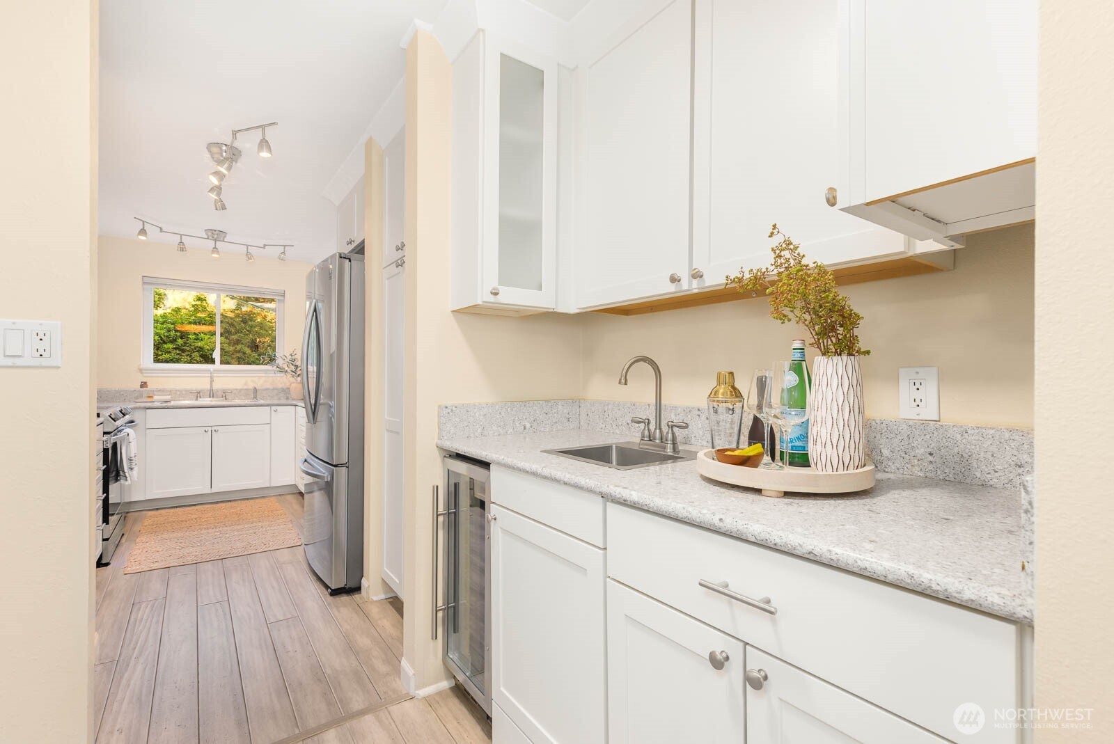 13279 15th Avenue Northeast, Unit B20 Seattle, WA 98125 - Photo 10 of 32 a kitchen with sink and cabinets