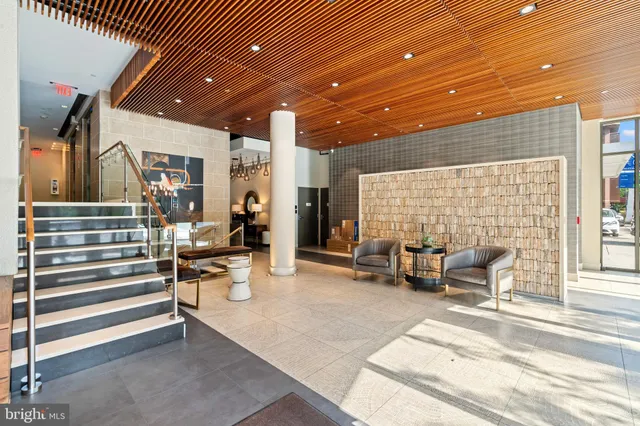 a view of a brick house with a large window