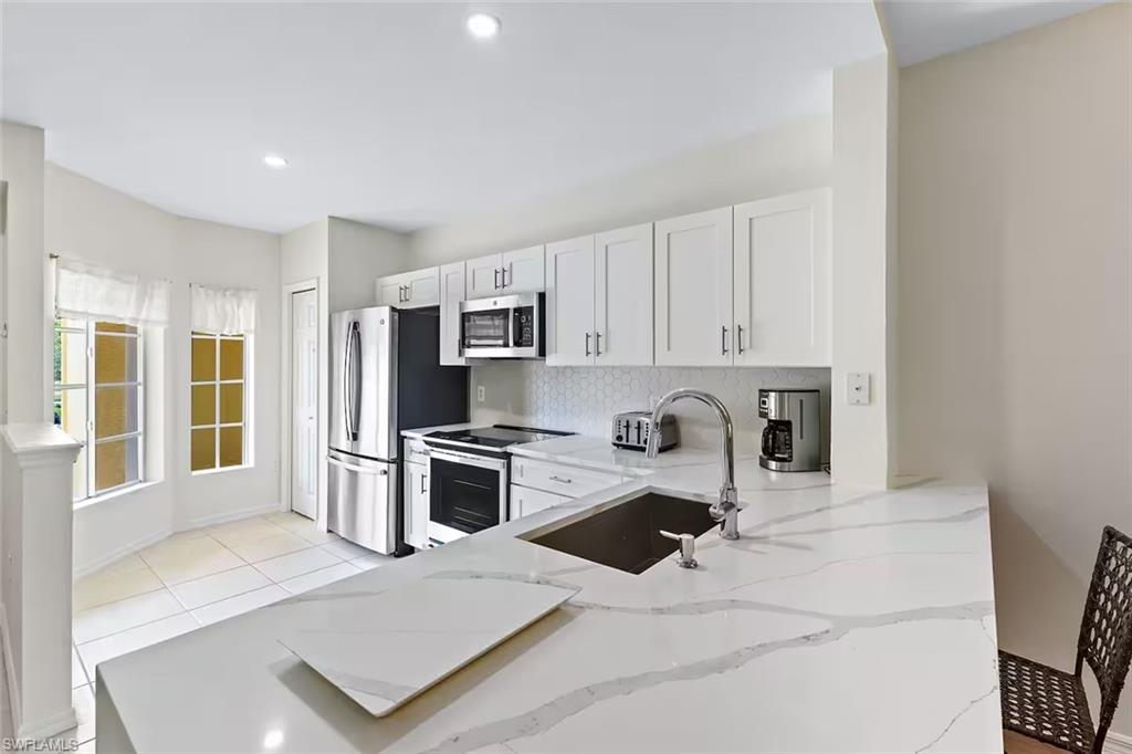 9185 Celeste Drive, Unit 204 Naples, FL 34113 - Photo 1 of 16