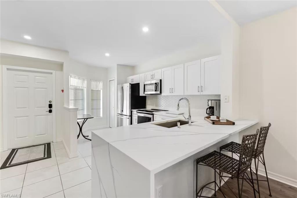 9185 Celeste Drive, Unit 204 Naples, FL 34113 - Photo 3 of 16