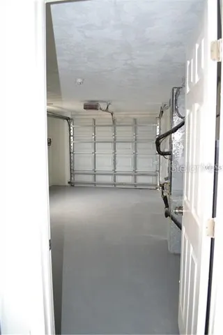 a view of a garage with stairs