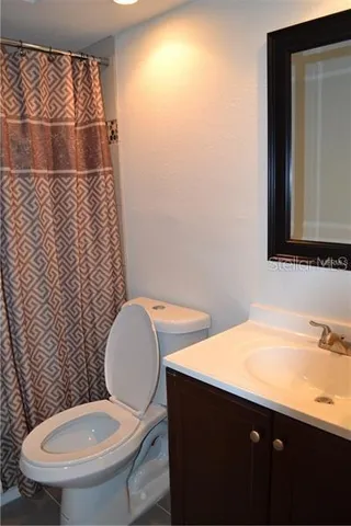 a bathroom with a sink and a toilet