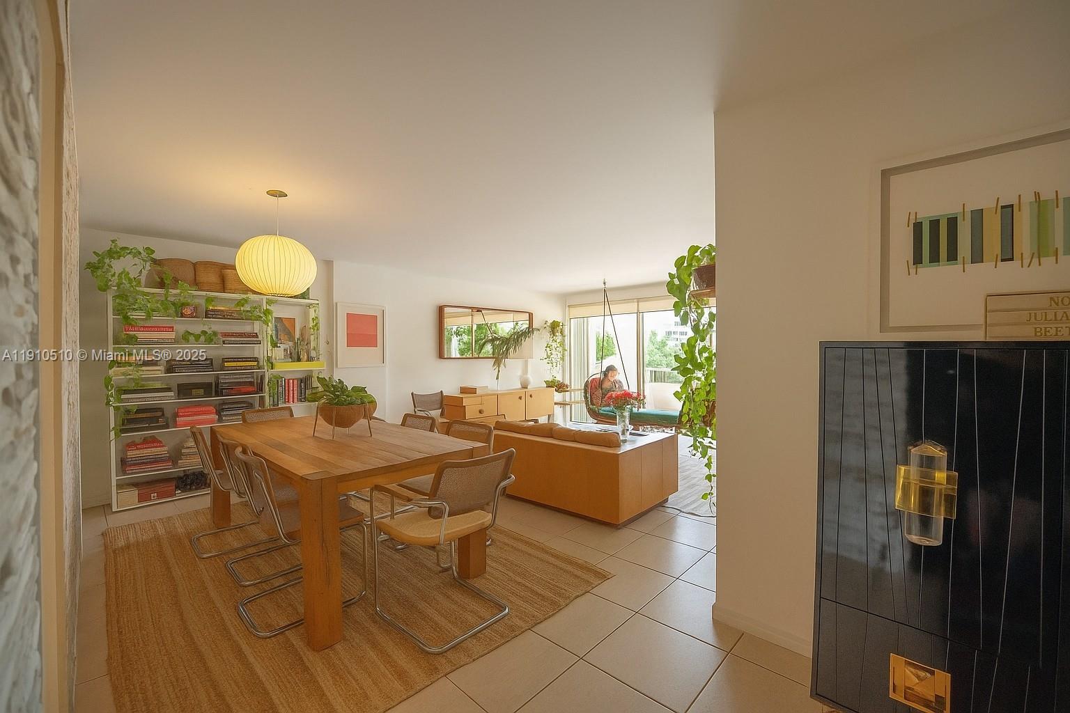 199 Ocean Ln Drive, Unit 313 Key Biscayne, FL 33149 - Photo 1 of 9 a view of a dining room with furniture window and outside view