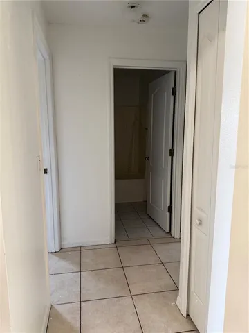 a bathroom with a toilet bathtub and shower