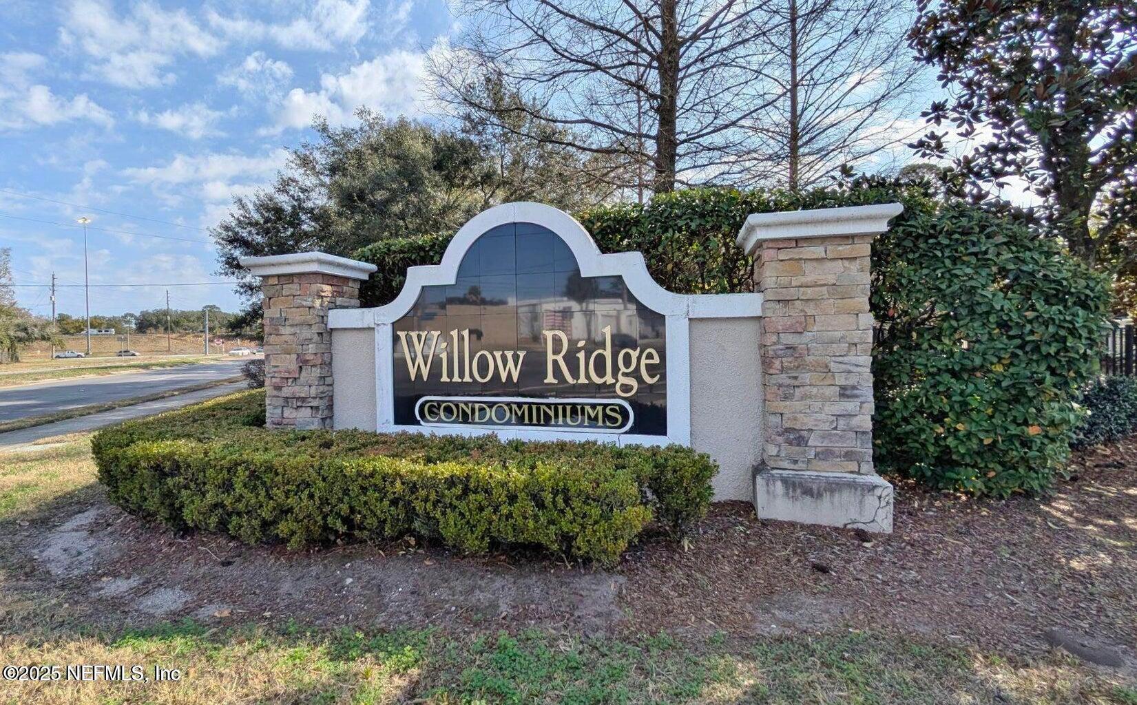 3620 Kirkpatrick Circle, Unit 3 Jacksonville, FL 32210 - Photo 19 of 22 a view of a park that has a sign board large trees