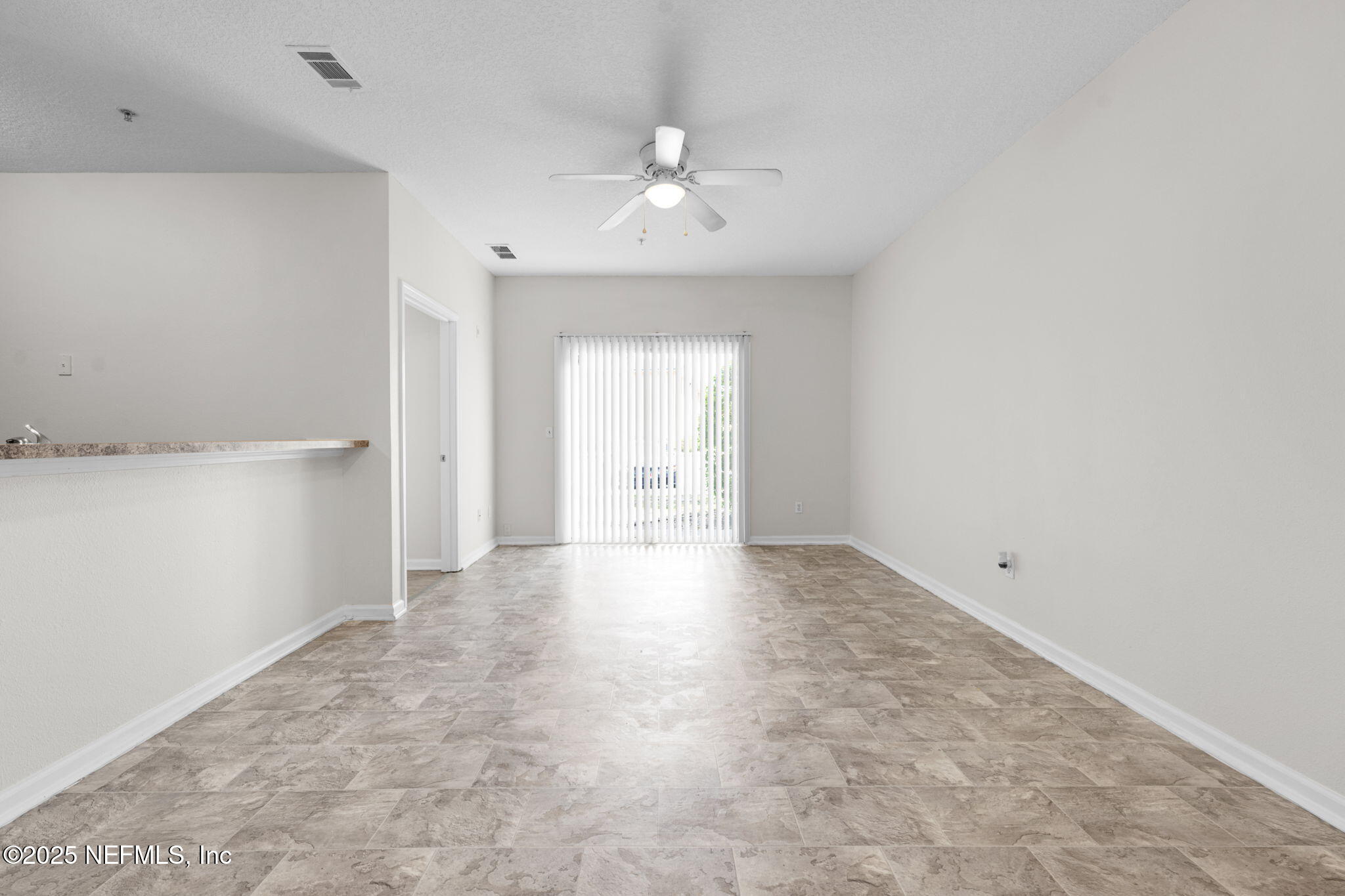 3620 Kirkpatrick Circle, Unit 3 Jacksonville, FL 32210 - Photo 6 of 22 a view of an empty room with a window