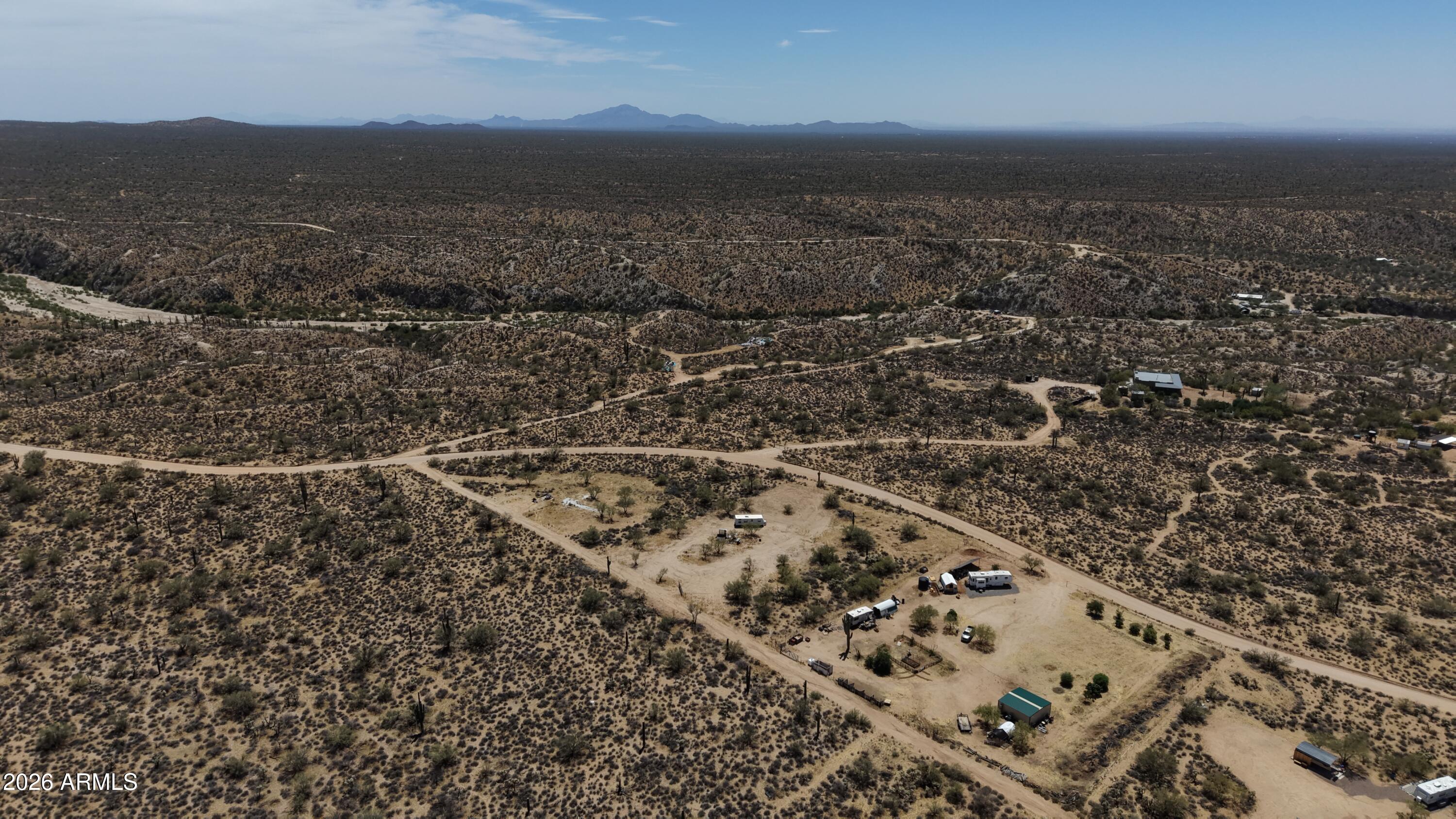 0 Cochran Road, Unit G Florence, AZ 85132 - Photo 4 of 10 an aerial view of house with yard and mountain view in back