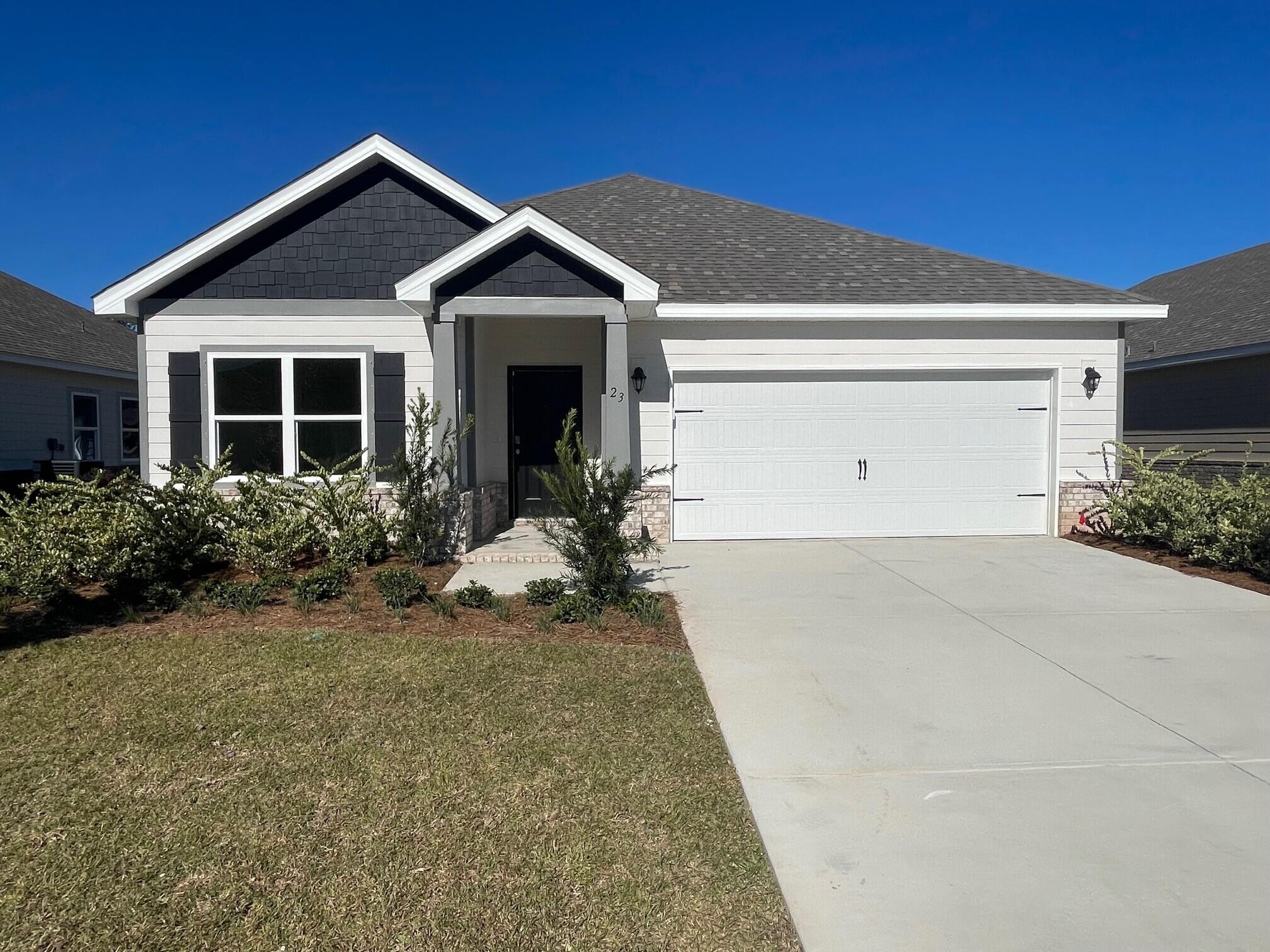 a front view of house with yard