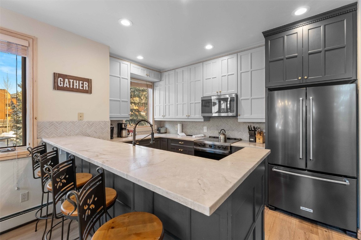 1459 East Keystone Road, Unit C1 Dillon, CO 80435 - Photo 7 of 27 Updated Kitchen with bar seating