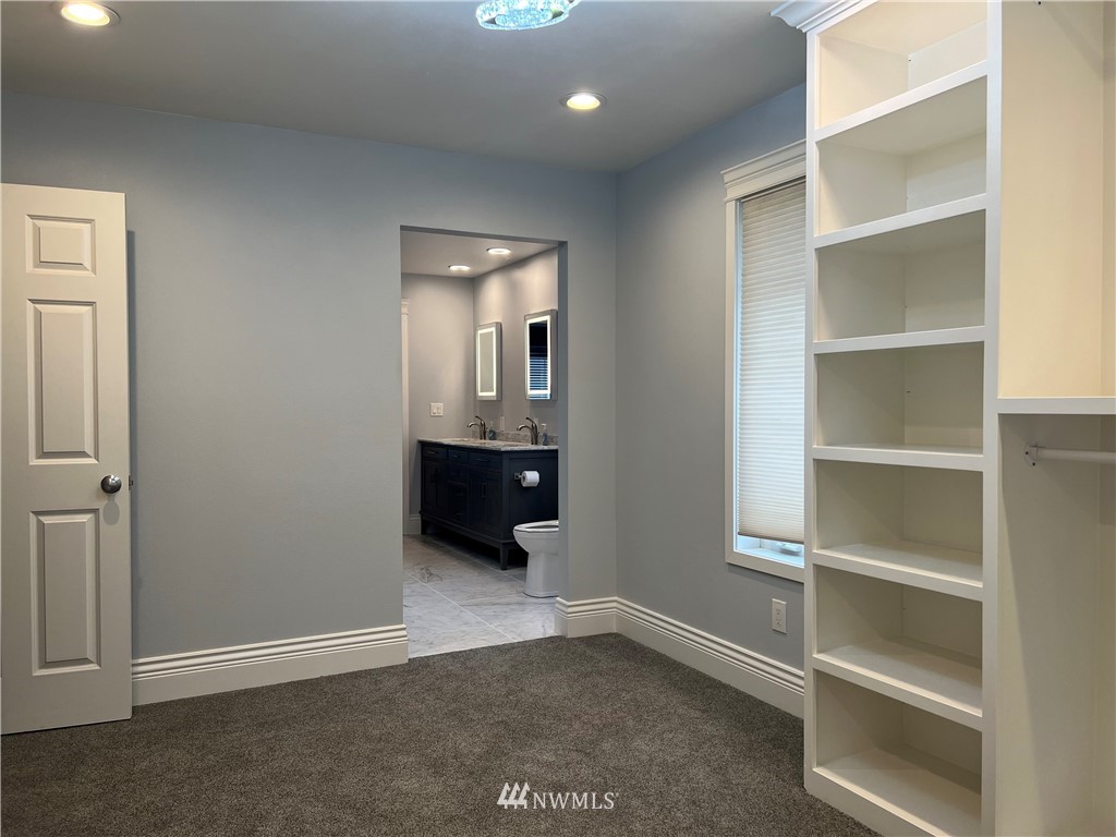8416 Delta Line Road Custer, WA 98240 - Photo 15 of 40 a view of an empty room with a cabinet