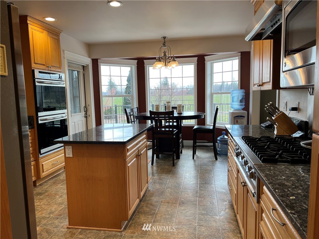 8416 Delta Line Road Custer, WA 98240 - Photo 10 of 40 a kitchen with lots of counter top space