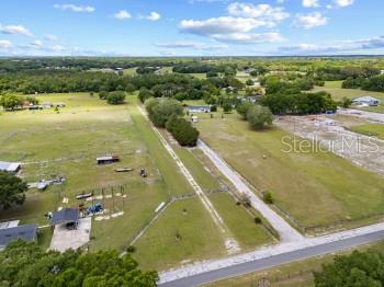 42415 Big Oak Road Altoona, FL 32702 - Photo 14 of 19 an aerial view of residential houses with outdoor space