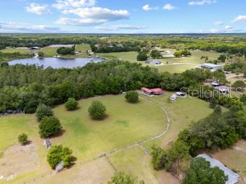 42415 Big Oak Road Altoona, FL 32702 - Photo 15 of 19 a view of a lake with a yard