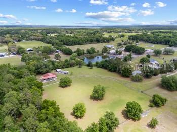 42415 Big Oak Road Altoona, FL 32702 - Photo 16 of 19 a view of a lake with a city