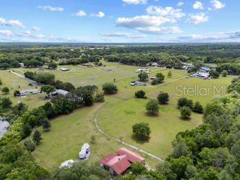 42415 Big Oak Road Altoona, FL 32702 - Photo 2 of 19 an aerial view of residential houses with outdoor space
