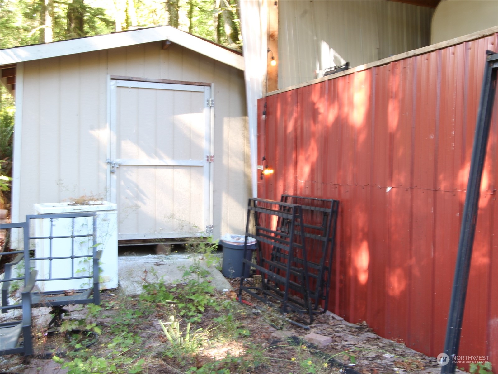 6426 Santa Fe Trail Maple Falls, WA 98266 - Photo 13 of 15 a backyard of a house with a yard and outdoor seating