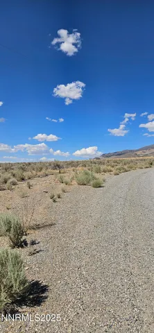 a view of beach and an ocean