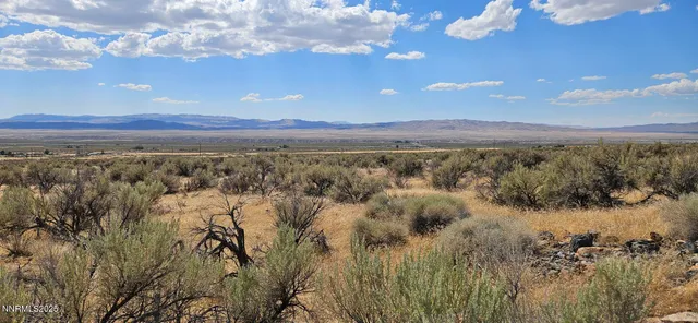 a view of an outdoor space with mountain view