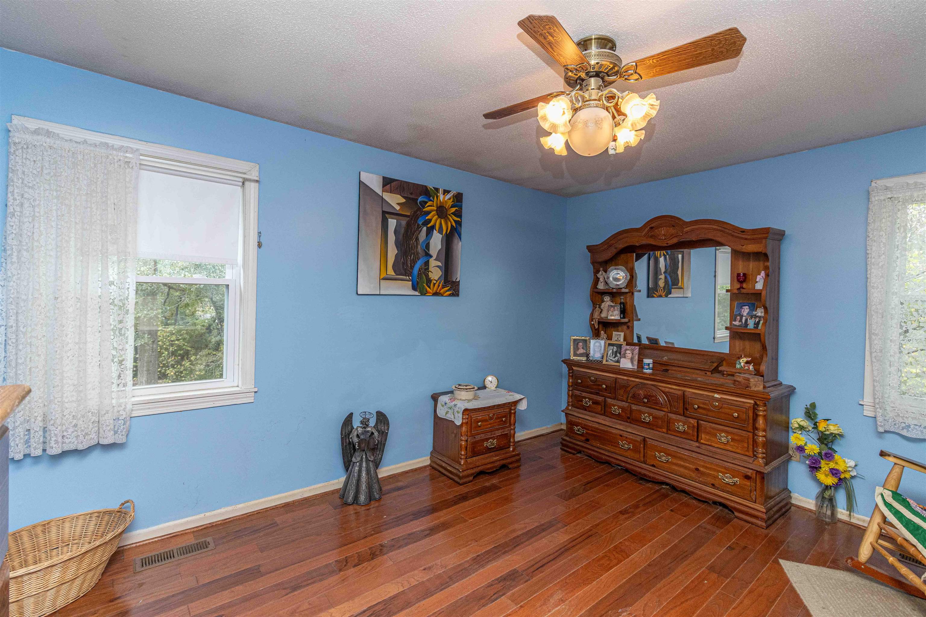260 Mitchell Street Selmer, TN 38375 - Photo 12 of 22 a bedroom with furniture and a window