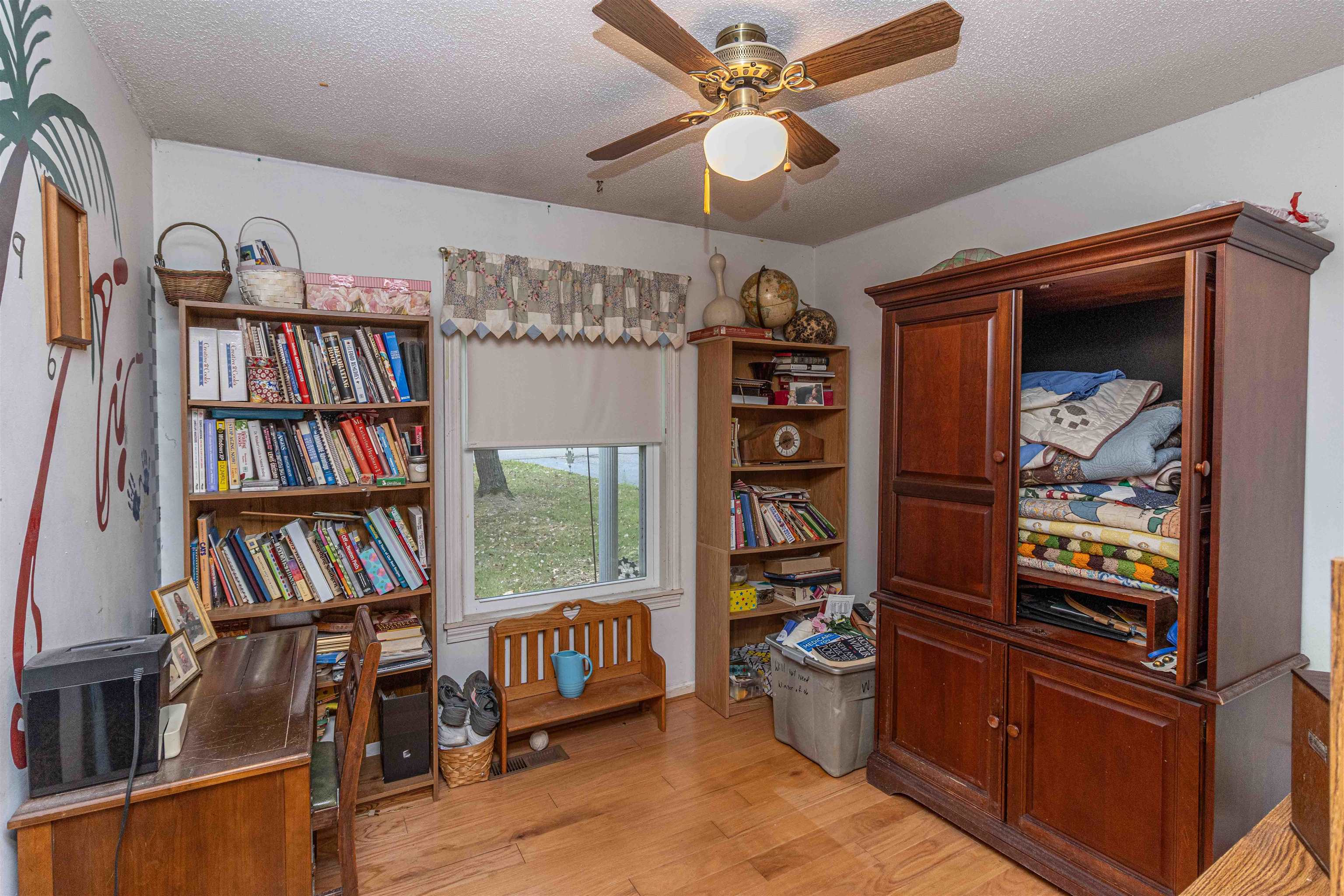 260 Mitchell Street Selmer, TN 38375 - Photo 15 of 22 a view of a livingroom with furniture and toys