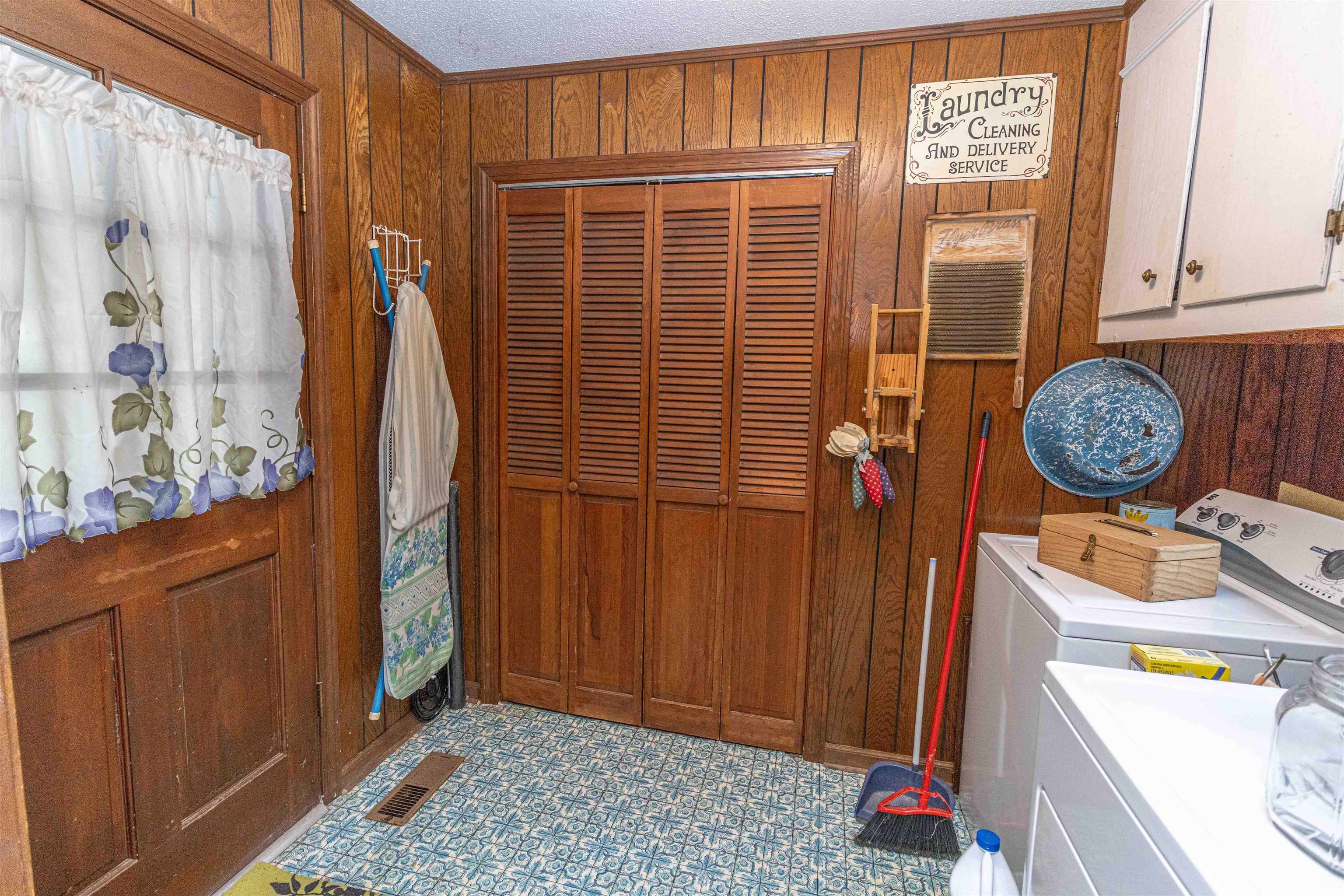 260 Mitchell Street Selmer, TN 38375 - Photo 16 of 22 a view of storage and utility room