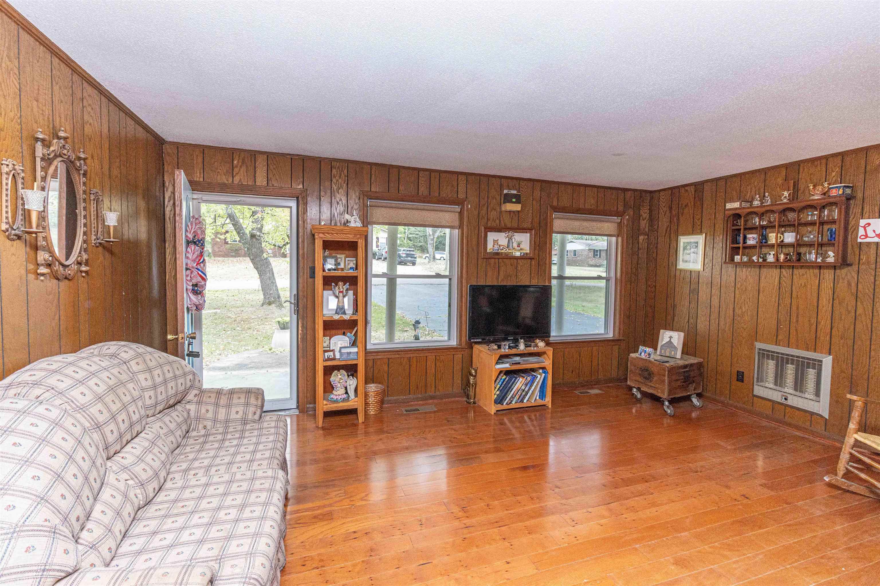 260 Mitchell Street Selmer, TN 38375 - Photo 6 of 22 a living room with furniture and large window
