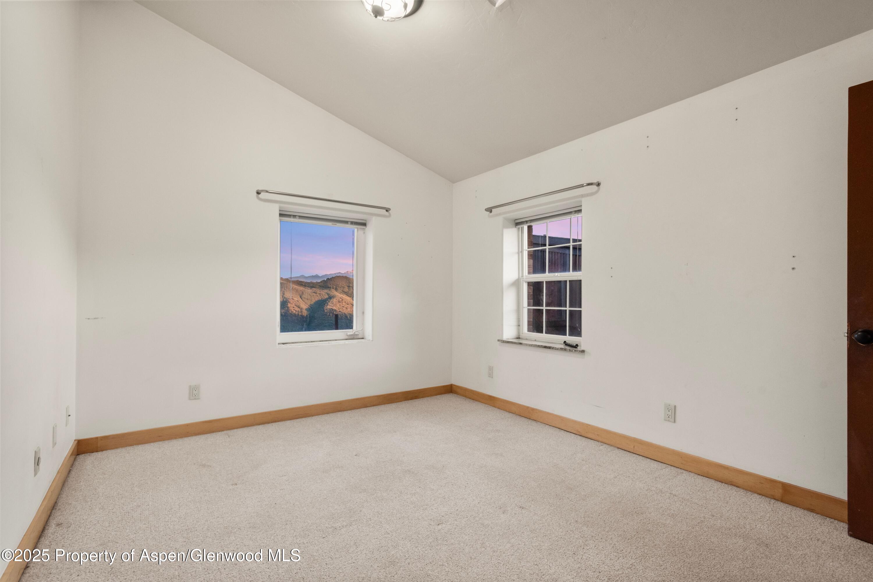 2800 Cedar Drive Basalt, CO 81621 - Photo 14 of 28 an empty room with windows