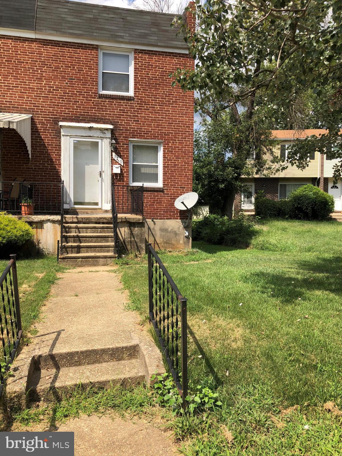 3710 Springwood Avenue Baltimore, MD 21206 - Photo 1 of 12 a front view of a house with a yard
