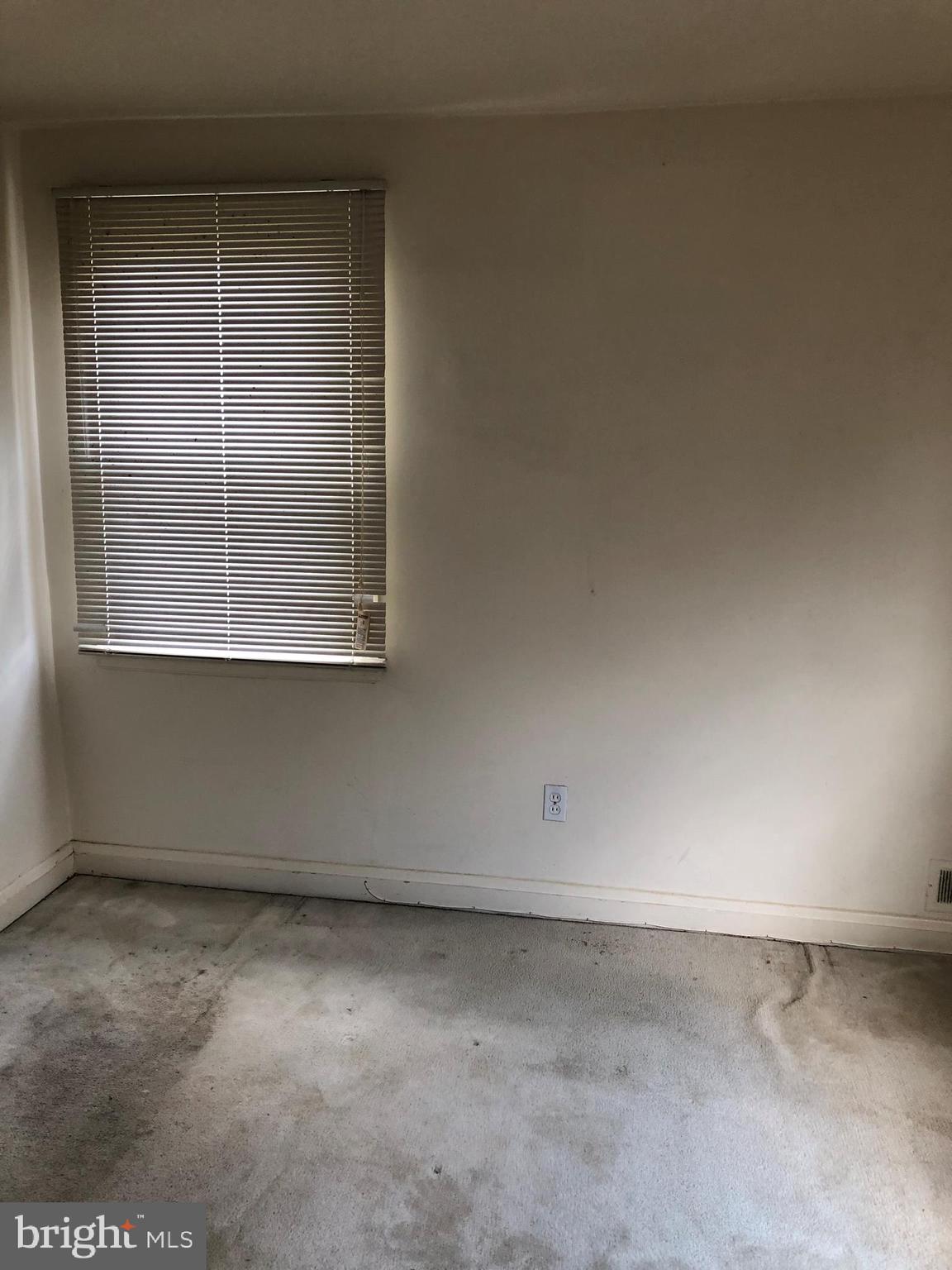 3710 Springwood Avenue Baltimore, MD 21206 - Photo 11 of 12 an empty room with a window