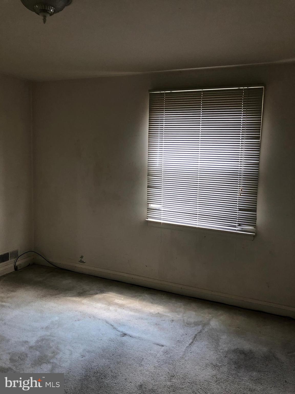 3710 Springwood Avenue Baltimore, MD 21206 - Photo 12 of 12 a view of an empty room with a window